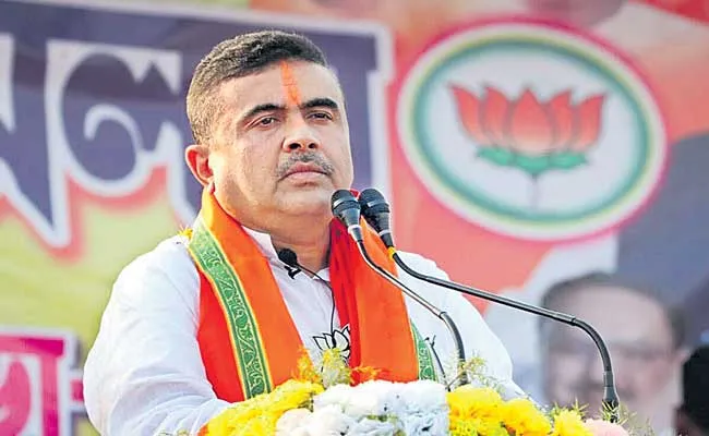 Suvendu Adhikari defeats Mamata Banerjee In Nandigram - Sakshi