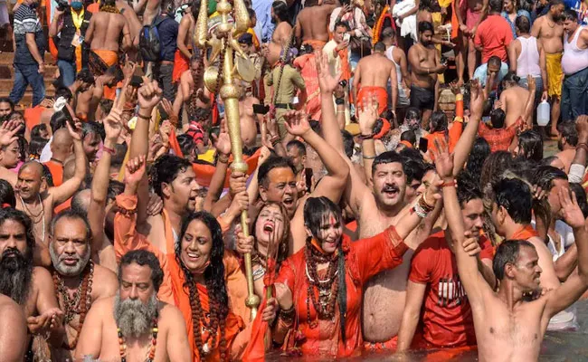 Kumbh Mela Top Official Says Unfair To Call Kumbh Mela Covid Super Spreader - Sakshi