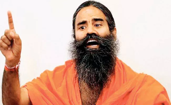 Covid vaccine has no useyoga, Ayurvedahe has dual cover :Ramdev  - Sakshi