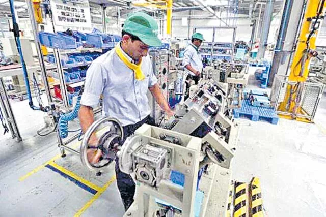 Manufacturing PMI Remains Steady In April Amid Second Covid-19 Wave - Sakshi