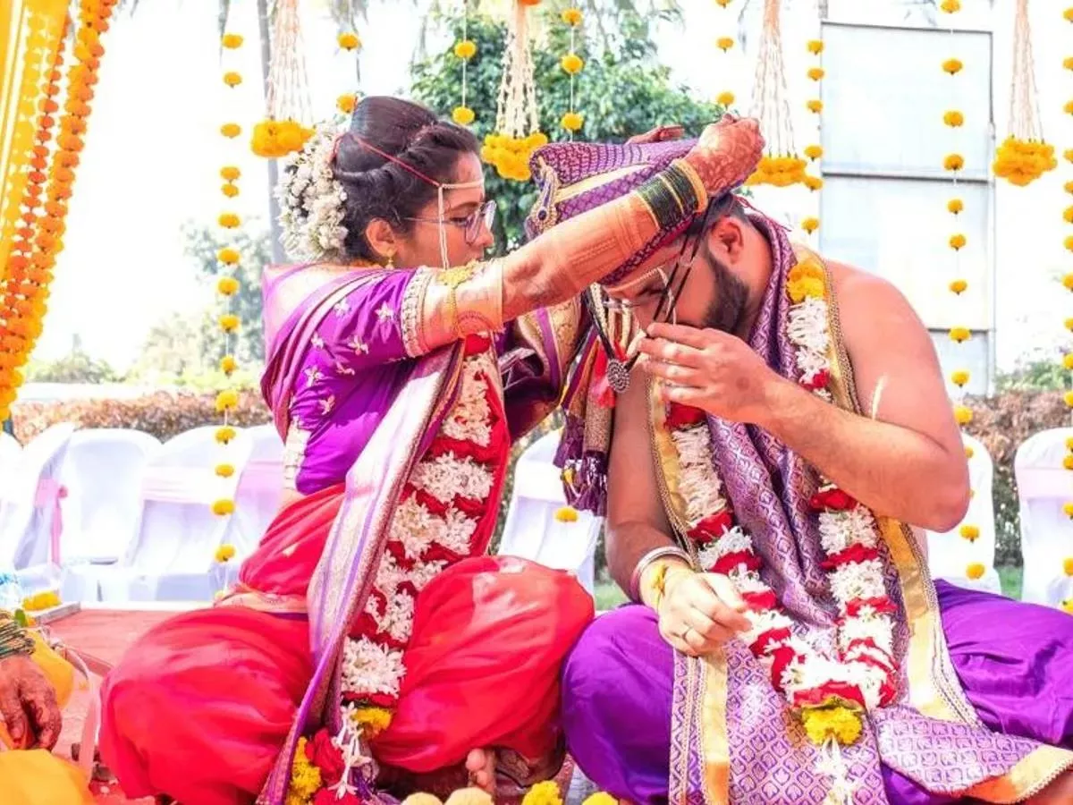 Groom Wears A Mangalsutra Along With His Wife on Wedding Day - Sakshi