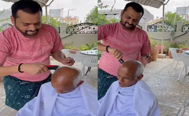 Bandla Ganesh Turns As Barber For His Father Video Goes Viral - Sakshi