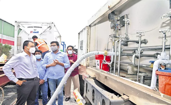 Three tankers of oxygen reached Krishnapatnam port - Sakshi