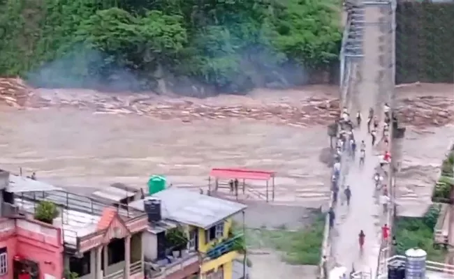 Heavy Rainfall In Nepal And Dozens Of Missing Due To Floods - Sakshi