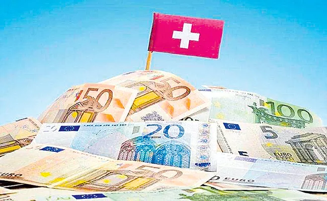 Indians funds in Swiss banks rise to over Rs 20,00 crore - Sakshi