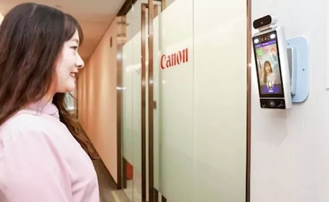 Canon Smile Recognition AI Only Lets Smiling Employees Allowed Into Offices - Sakshi