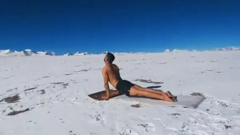 ITBP Officer Perform Surya namaskar in Sub Zero Temperature - Sakshi