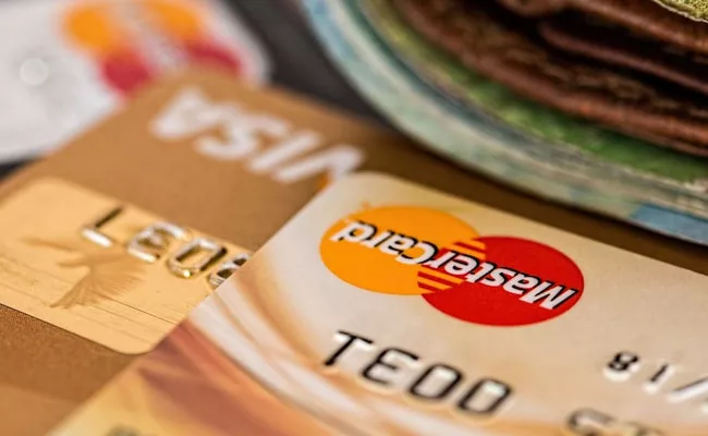 Global Chip Shortage Could Affect Supply Of Credit Debit Cards Industry Body Warns - Sakshi