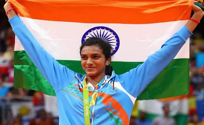 Pv Sindhu Become A One Of India s Falg Bearers In Tokyo Olympics - Sakshi