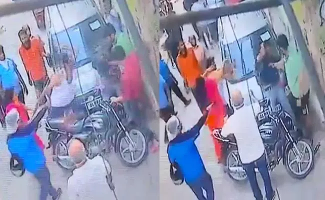 Delhi Man Hit With Sticks On Main Road Shocks Netigens By CCTV Footage - Sakshi