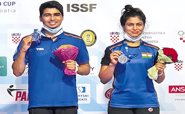 Manu Bhaker And Saurabh Chaudhary Win Mixed Silver - Sakshi