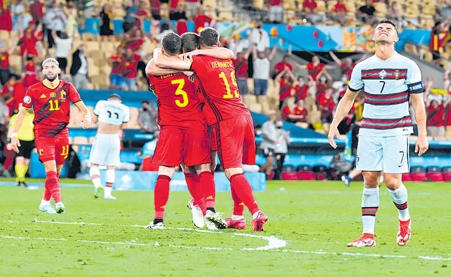 Belgium edges defending champion Portugal to reach quarterfinals - Sakshi