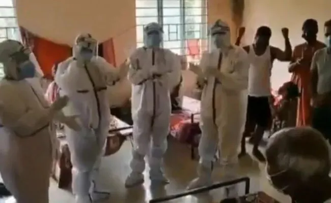 Assam doctors dance to songs to cheer up Covid-19 patients viral video - Sakshi