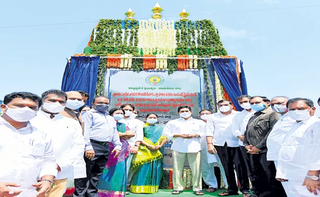 CM Jagan Laying of foundation stone for Krishna Karakatta road widening works - Sakshi