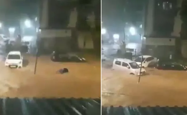 Mumbai Heavy Rains: Cars Swept Away Streets Flooded - Sakshi