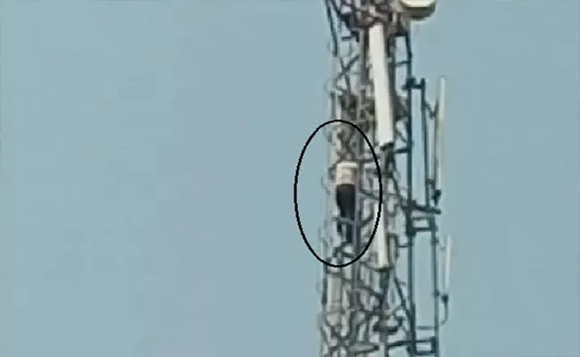 Man Climbs Mobile Tower In Nalgonda - Sakshi