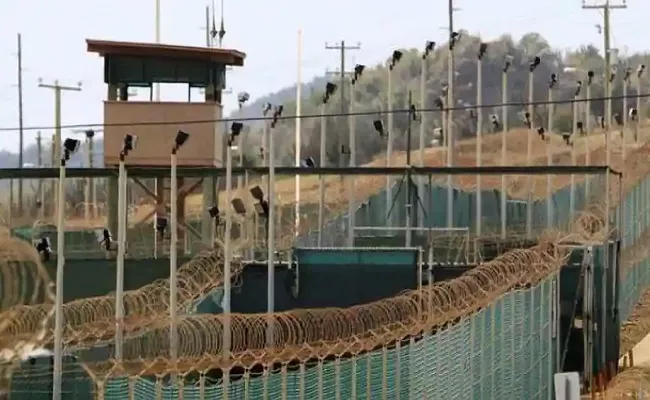 US transfers the first detainee out of Guantanamo - Sakshi