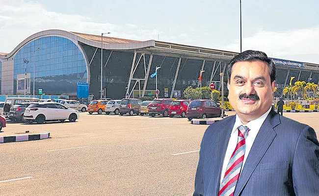 AAI committees find Adani group in violation of branding, logo displayed - Sakshi