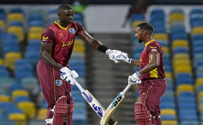 WI Vs AUS: Nicholas Pooran Captain Innings Helps Leveling ODI Series - Sakshi