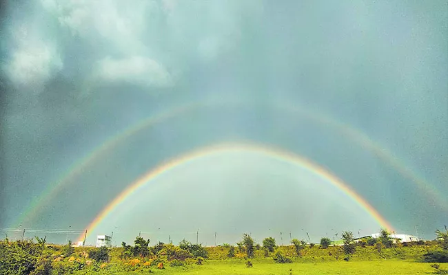 2 Rainbows At Nizamabad And Backwater Effect Jayashankar Bhupalpally - Sakshi