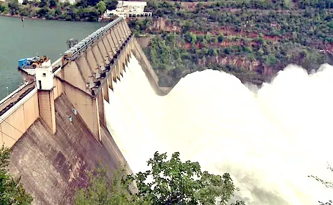 Srisailam Dam 10 Gates Lifted Due To Heavy Flood Water - Sakshi