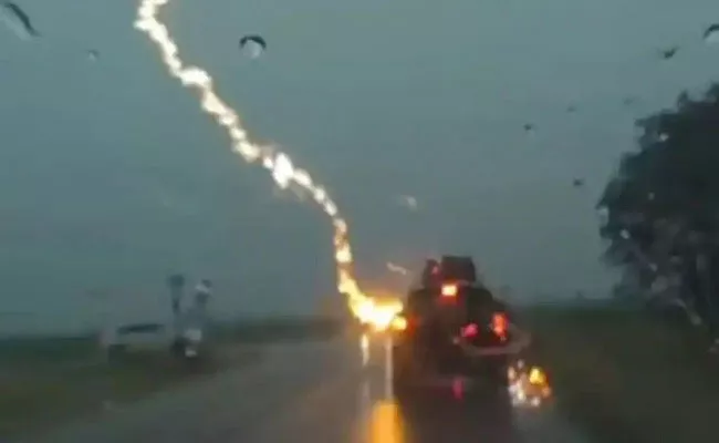 Viral: Captures The Exact Moment Car Carrying Family Struck Lightning - Sakshi