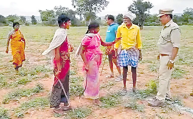 Achampet Women Pour Petrol ON Government Officials Over Podu Land Issue - Sakshi