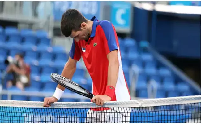 Novak Djokovic Lost Bronze Medal Match Against Carreno Busta - Sakshi