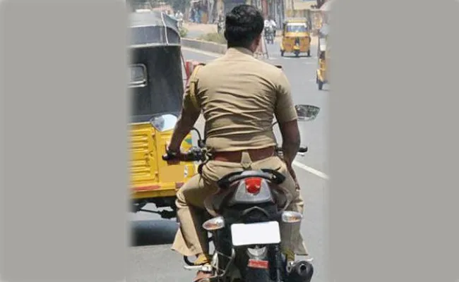 Police Without Helmets Were Fined In Krishna District - Sakshi