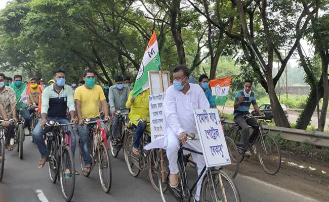 Bengal Minister Cycles 38km To Reach Assembly Protest Fuel Price Rise - Sakshi