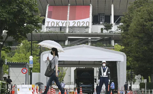 Tokyo Olympics: Japan Government Announces Virus Emergency In Tokyo Throughout Olympics - Sakshi