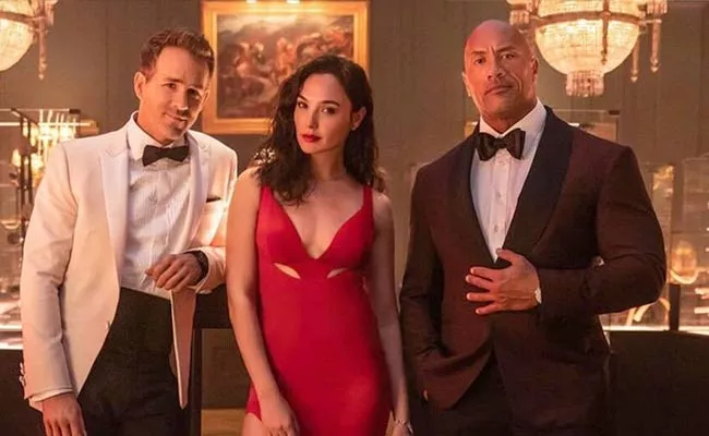 Netflix Huge Budget Red Notice Starrer Dwayne Johnson Gal Gadot And Ryan Reynold Gets Release Date - Sakshi