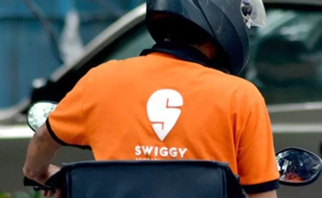 Swiggy Fined Rs 20,000 By District Consumer Disputes Redressal Commission For Wrong GST  - Sakshi