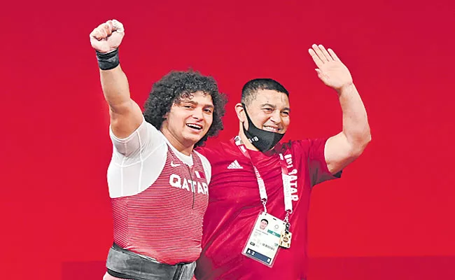 Weightlifter Meso wins Qatar first ever Olympic gold medal - Sakshi