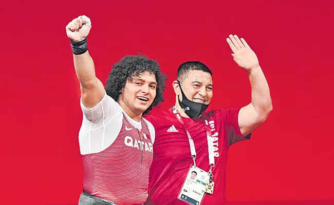 Weightlifter Meso Wins Qatars First Ever Olympic Gold Medal - Sakshi