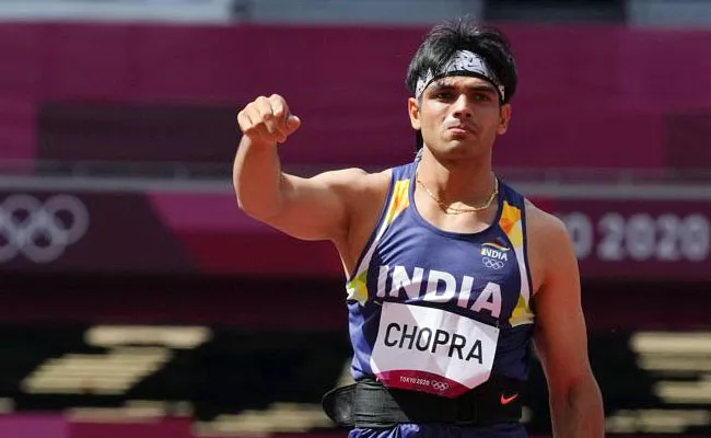 Neeraj Chopra And Other Tokyo Olympics Medalists Tax On Prize Money - Sakshi