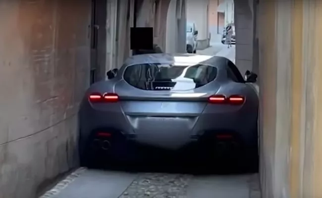 Ferrari Roma Supercar Gets Horribly Stuck in a Narrow Italian Street - Sakshi