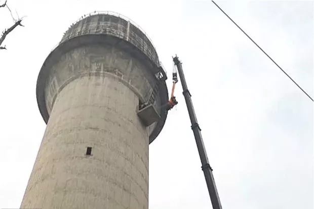 Man Climbs Water Tank In Warangal - Sakshi