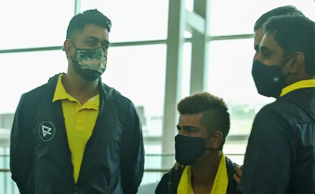 MS Dhoni Spotted At Chennai Airport CSK Players Leave For Dubai Viral - Sakshi