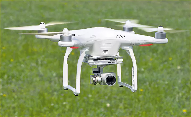 Drones in addition to survey Andhra Pradesh - Sakshi