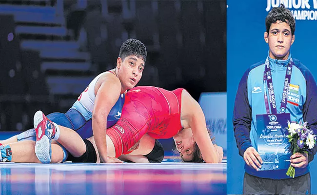 India Ravinder Wins Silver, 3 Others Win Bronze - Sakshi