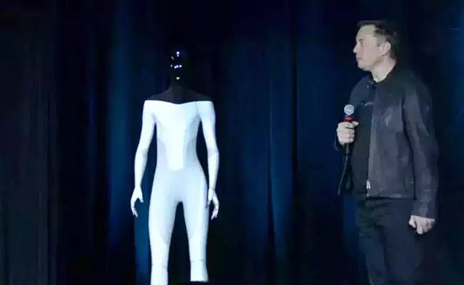 Tesla Humanoid Robot Elon Musk Introduces AI Tesla Bot - Sakshi