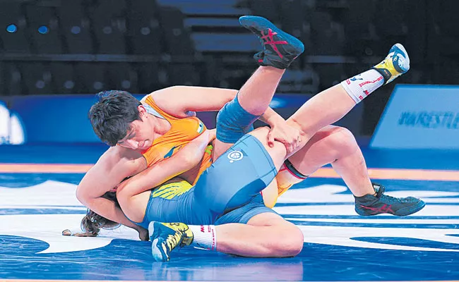 Silver For Sanju Devi, Bhateri on Junior World Wrestling Championship - Sakshi