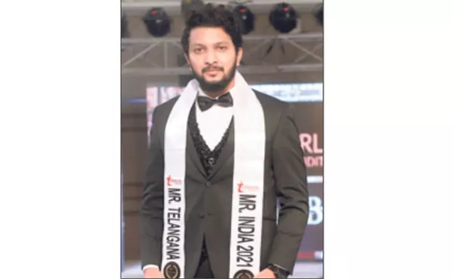 Mister Telangana Title Won By Renikunta Charan In Adilabad - Sakshi