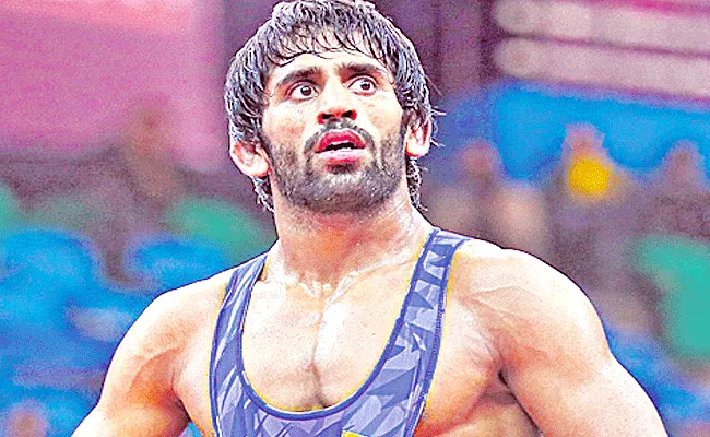 Bajrang Punia Skip Wrestling World Championships October Ligament Tear - Sakshi