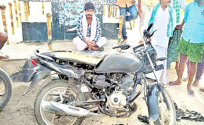 Young Man Burns His New Bike Protest Of Petrol Prices Hike Mahabubnagar - Sakshi