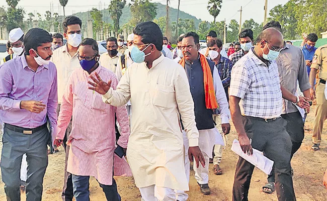 Members of the National ST Commission examining Polavaram Rehabilitation Colony - Sakshi