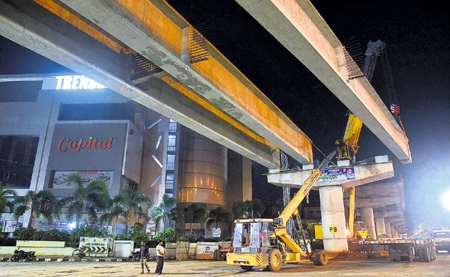 Arguments over the Benz Circle flyover Andhra Pradesh High Court - Sakshi