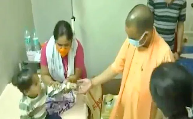 Suspicious fever 32 children and seven adults effected: UP CM Adityanath - Sakshi