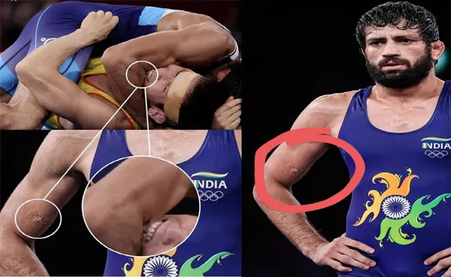 Sehwag Slams Wrestler Nurislam Disrespectful Act Of Biting Ravi Dahiya Arm - Sakshi